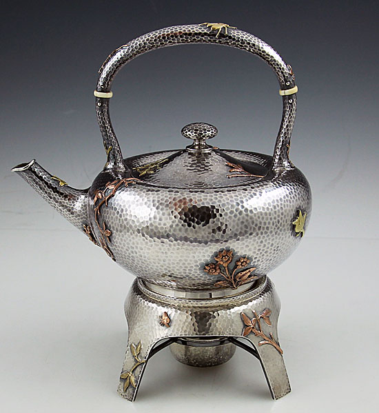 Dominick and Haff sterling hammered mixed metals kettle on stand circa 1880