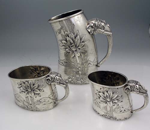 reed and barton figural silver pitchers