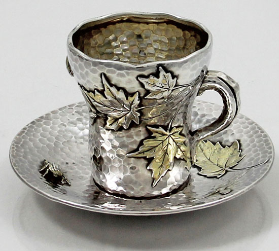 Tiffany antique demitasse cup and saucer with applied leaves and bugs circa 1880