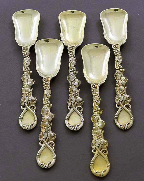 English silver gold washed master salts spoons in the chased vine pattern