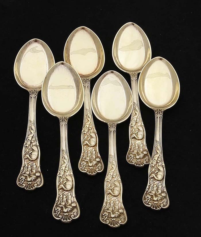 English silver ice cream spoons in the Stag Hunt pattern by Goldsmiths and Silversmiths
