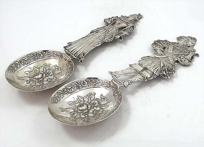German silver figural serving spoons