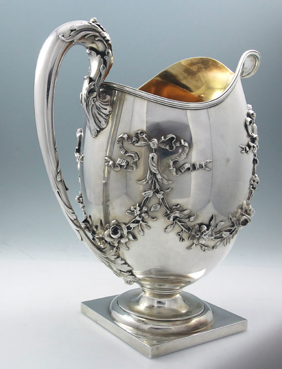 Whiting sterling silver antique pitcher with applied floral swags