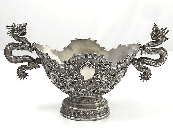 antique Chinese silver bowl with dragon handles and chrysanthemums by Wang Hing