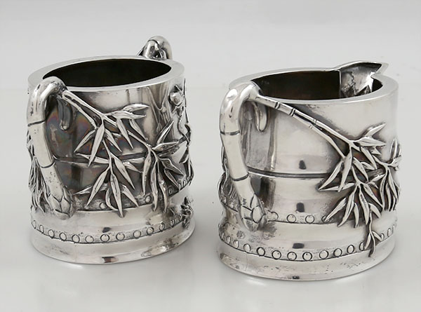 Chinese silver sugar and creamer with applied bamboo and bugs by Luen Wo
