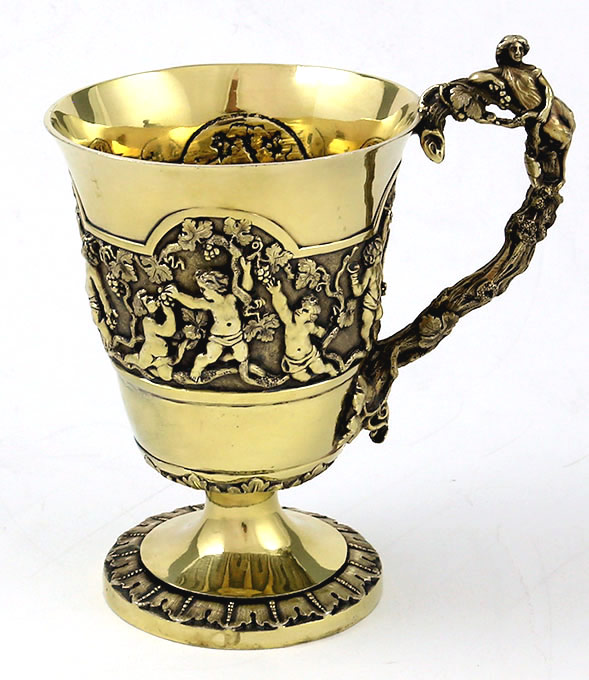 English silver gilt figural cup with putti