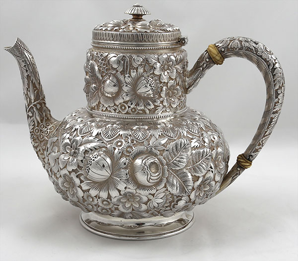 Gorham antique sterling silver teapot in the Eglantine pattern with hand chased floral detail