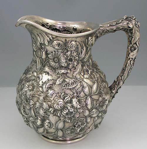 S Kirk and Son Repousse sterling silver pitcher