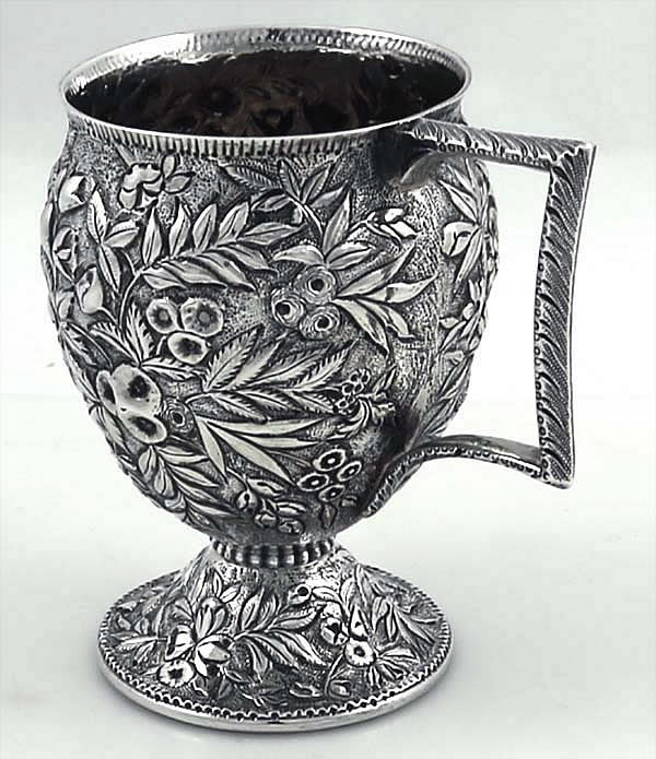 Kirk 11 ounce antique silver repousse cup