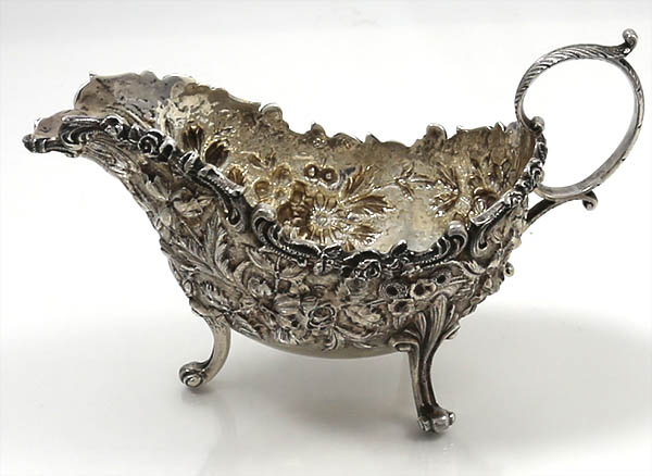 antique sterling silver gravy boat with repousse chasing by Kirk of Baltimore