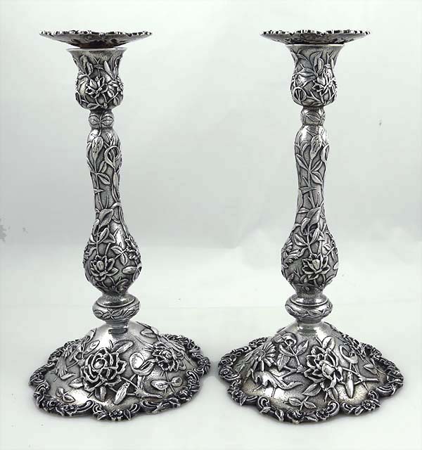 pair of fine antique Kirk and Son antique sterling candlesticks with chased flowers and vines
