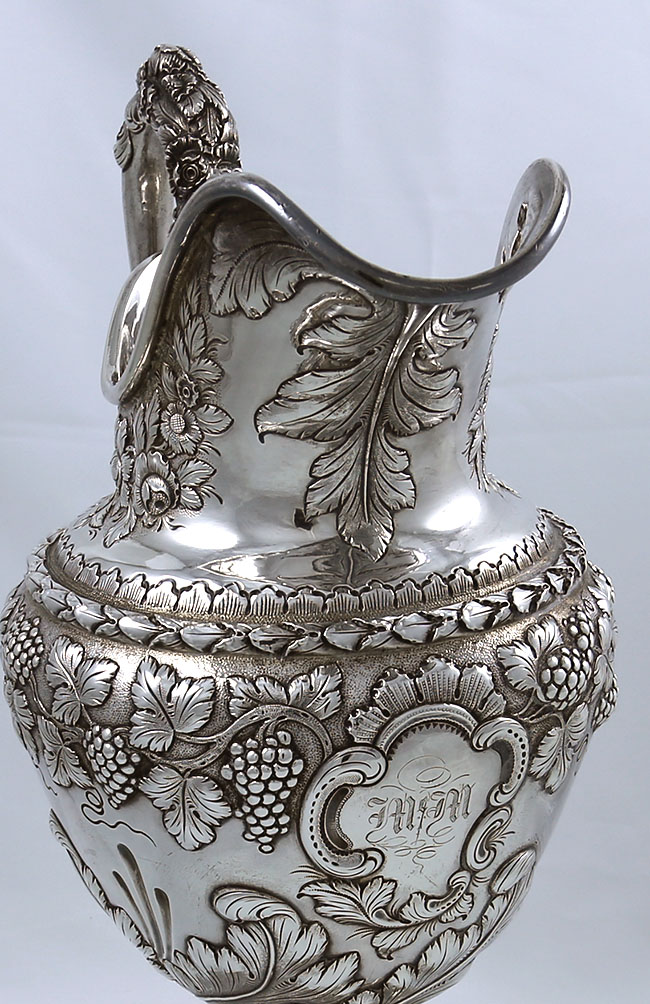 antique Kirk hand chased silver pitcher with grapes and vines