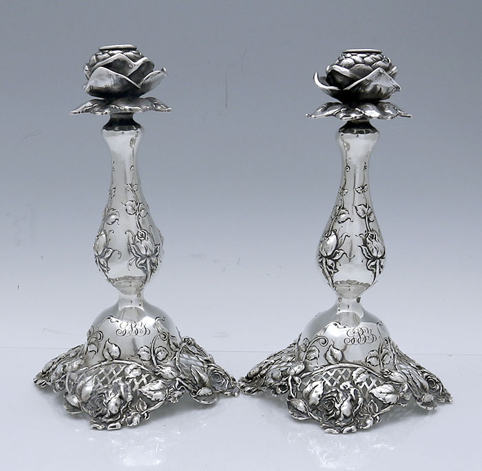 Redlich antique sterling silver candlesticks eith cast roses and pierced detail