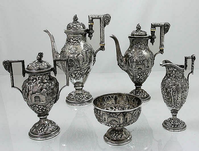 Schofield antique sterling silver five piece teaset with landscape chasing