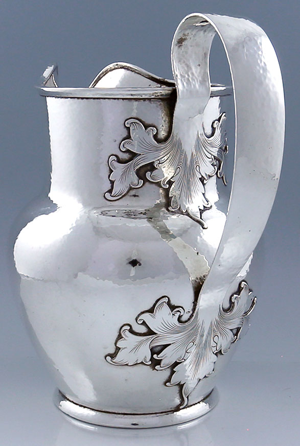 Shreve sterling large pitcher hammered with  art nouveau applied handle