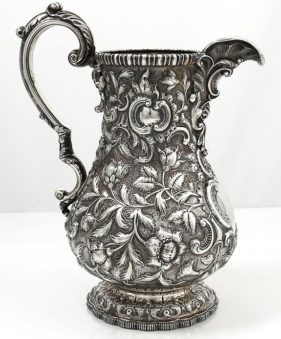 Tiffany Grosjean and Woodward coin silver repousse pitcher