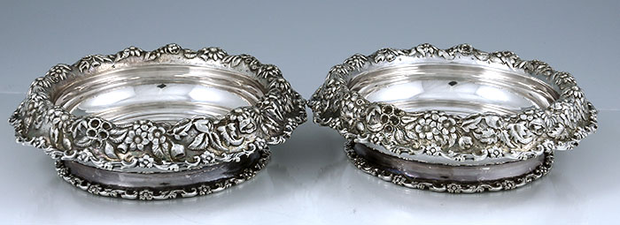 pair of Tiffany and Company silver soldered wine bottle coasters