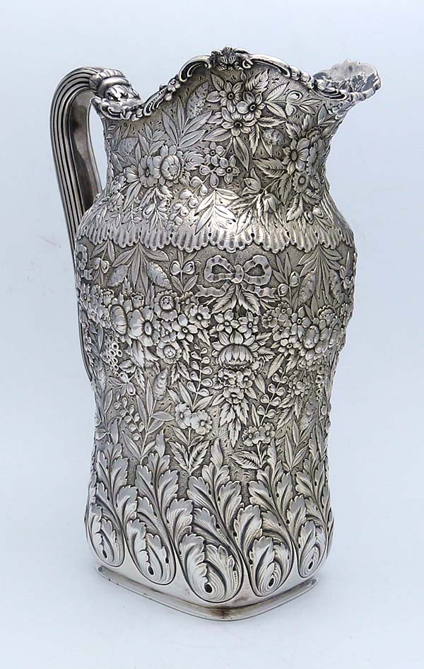 Tiffany antique sterling silver pitcher hand chased