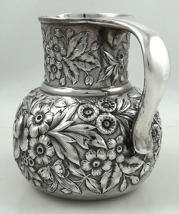 Whiting antique sterling repousse pitcher chased with flowers circa 1890
