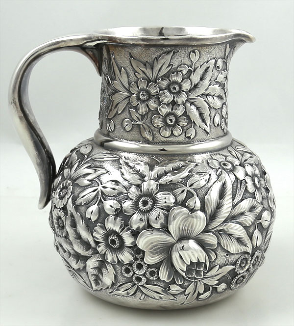 Whiting antique sterling repousse pitcher chased with flowers circa 1890
