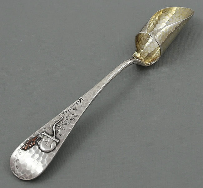 Whiting mixed metals cheese scoop