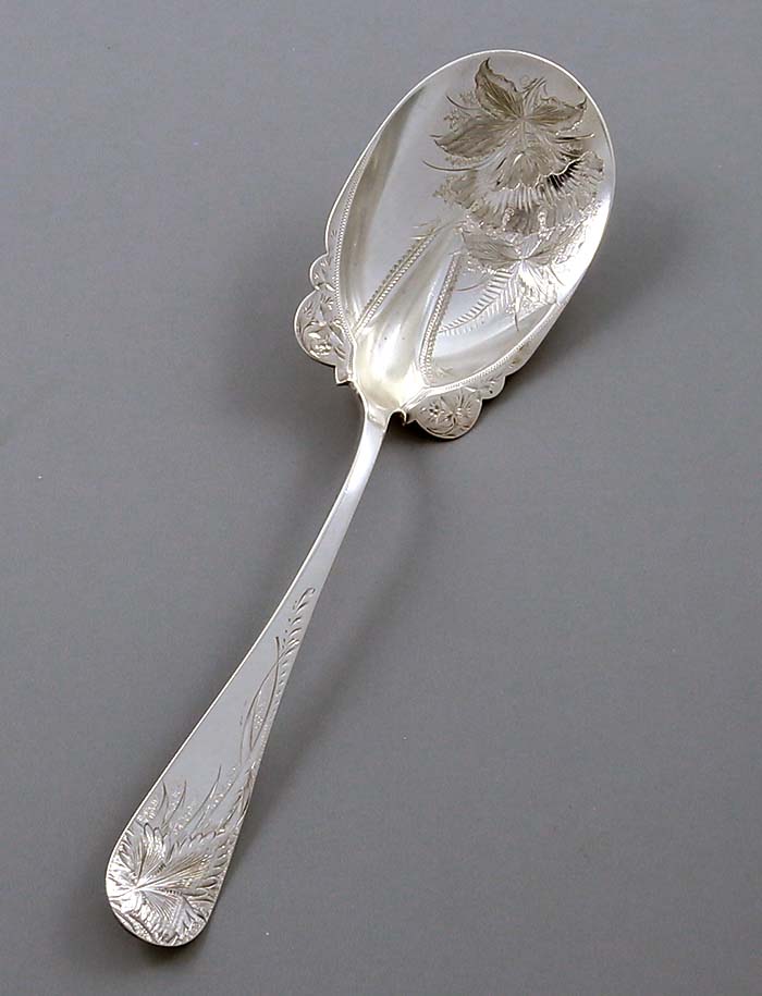 antique sterling bright cut engraved spoon retailed by Hennigen Bates Company