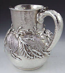 Important Tiffany antique sterling silver pitcher with applied shells