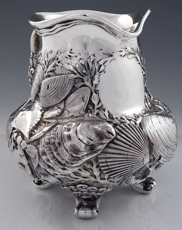 Rare Whiting antique sterling silver pitcher with chased three dimensional shells and ornate handle
