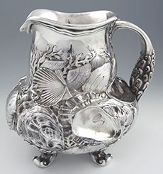 Important Whiting sterling pitcher with chased shells nautical theme