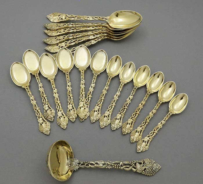 Chased and pierced vine flatware spoons and ladle by Francis Higgins