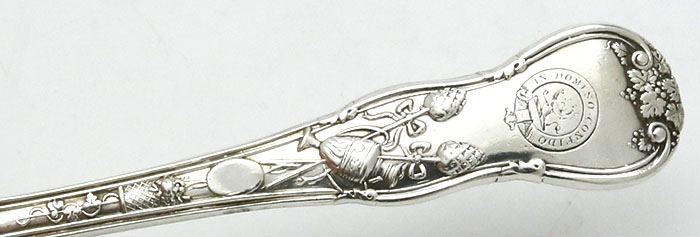 crest on English silver Bacchanalian forks