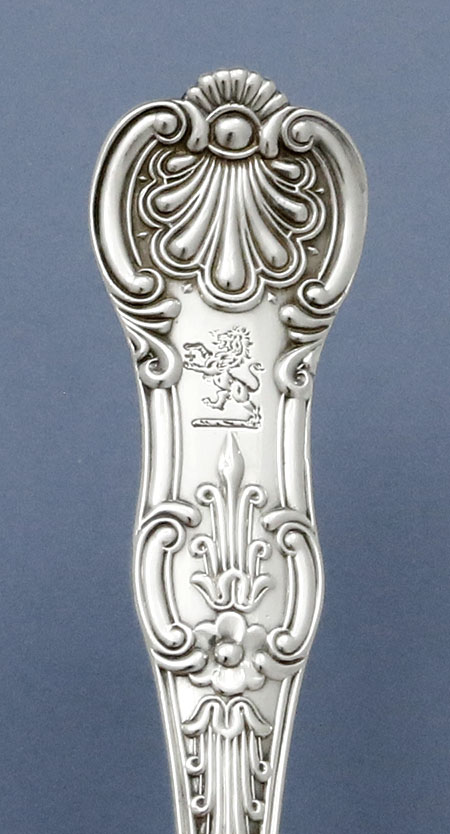 engraved crest of rampant lion on fork Queen's pattern