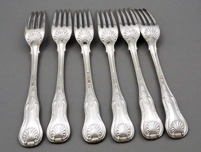 reverse of six antique silver dinner forks London 1820 King's pattern