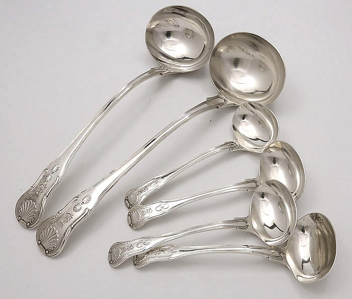 serving pieces in English antique silver set of cutlery