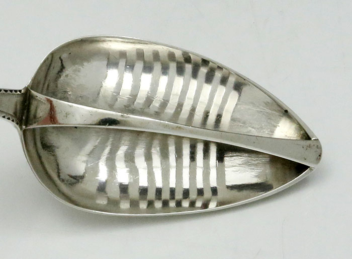 Bowl of Irish divided stuffing spoon