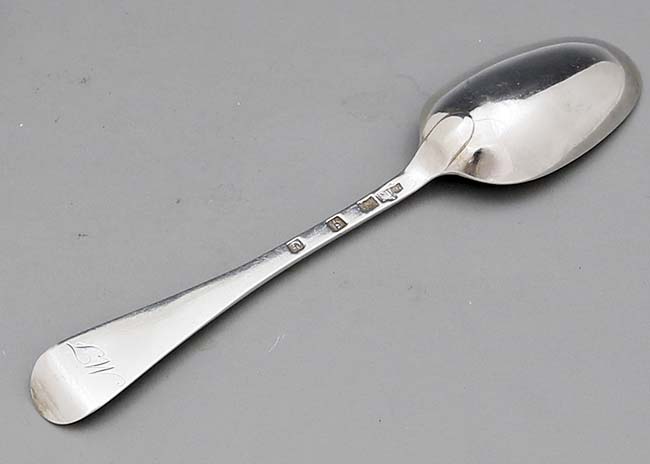 reverse of Scottish antique silver tablespoon with hallmarks James Welsh