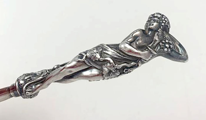 cast figural handle of Caldwell spoon