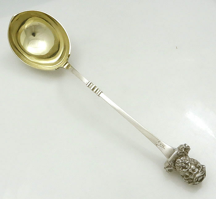Duhme antique coin silver soup ladle with cast bust terminal
