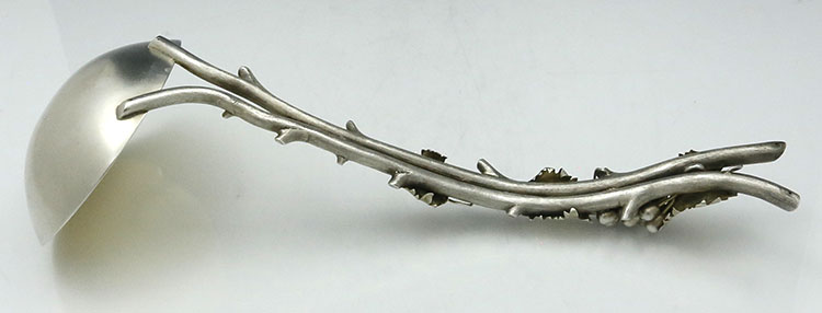 reverse of sterling silver grape mitif punch ladle
