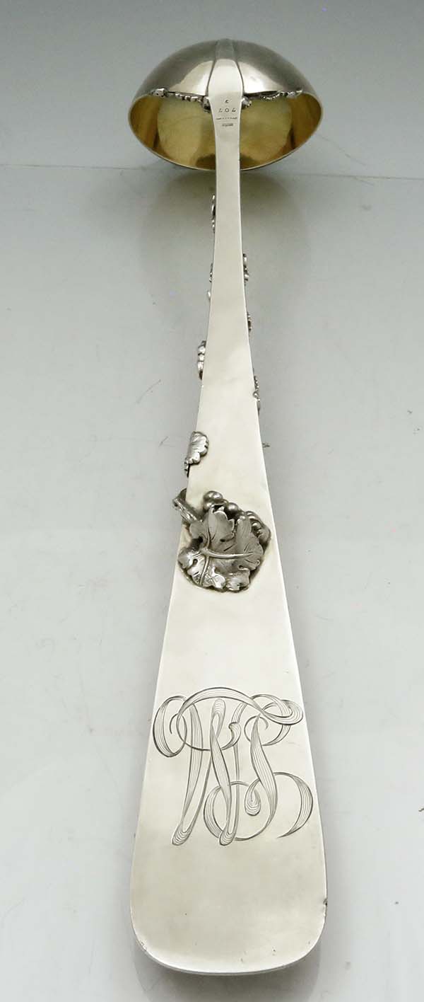 reverse side of rare Gorham sterling 1895 punch ladle with grape motif applied