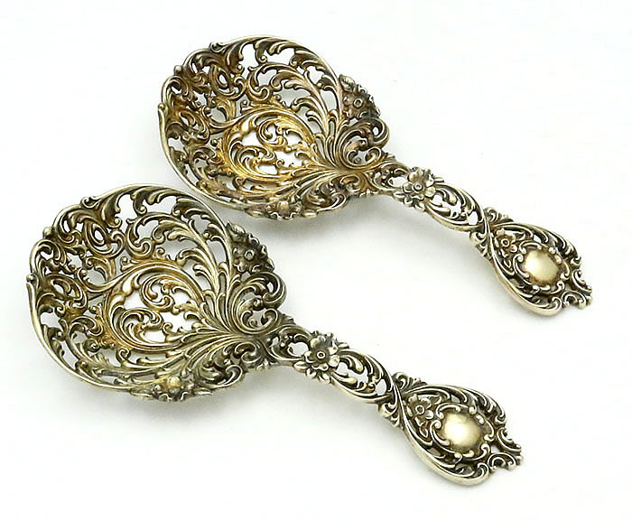 pair of Redlich antique sterling cast bon bon spoons
