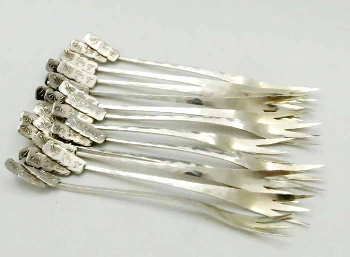 Set of 12 Shiebler hammered sterling cocktail forks