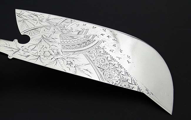 fine engraved blade of Shiebler hatchet