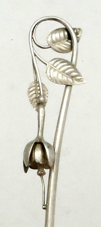 fuschia handle on spoon