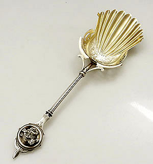George Sharp antique sterling scoop with fluted bowl and lion terminal