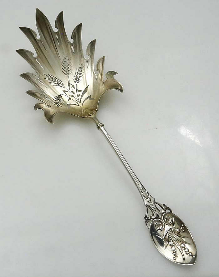 Gorham antique sterling silver macaroni server pierced with wheat pattern on the gold washed bowl