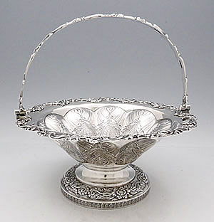 A E Warner Baltimore  antique coin silver pair of baskets chased with swing handles
