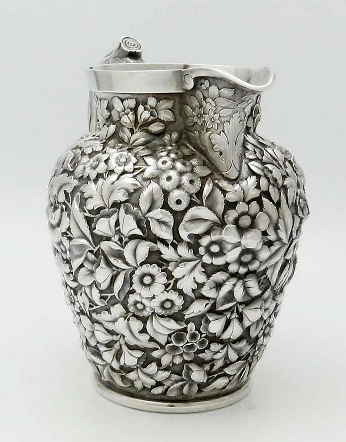 Krider antique sterling silver repousse pitcher