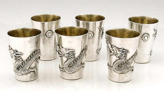 six Chinese silver dragon cups