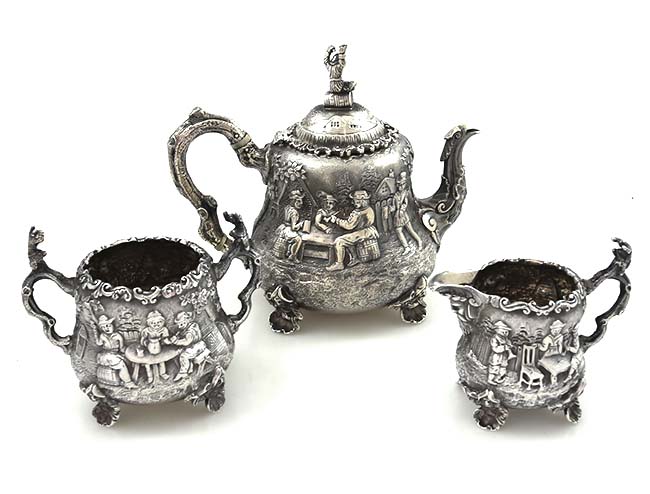 Frederick Elkington English silver three piece figural tea set 